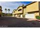 A sunny apartment complex, enhanced by a beautiful brick driveway, adding charm to community living at 1605 Crimson Hills Dr # 204, Las Vegas, NV 89128