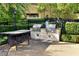 Community grill area featuring dual stainless steel grills and convenient prep space at 1605 Crimson Hills Dr # 204, Las Vegas, NV 89128