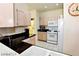 Well-lit kitchen equipped with appliances and ample counter space at 1605 Crimson Hills Dr # 204, Las Vegas, NV 89128