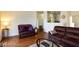 Open-concept living area with hardwood floors and comfortable seating at 1605 Crimson Hills Dr # 204, Las Vegas, NV 89128