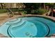 A community spa is shown with mosaic tile and jets at 1605 Crimson Hills Dr # 204, Las Vegas, NV 89128