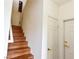 Stairway with hardwood steps leading to the upper level of the condo at 1605 Crimson Hills Dr # 204, Las Vegas, NV 89128