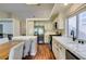 Bright kitchen with stainless steel appliances, granite countertops, and a breakfast bar at 1824 Dawn Ridge Ave, Henderson, NV 89074