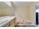 A single sink and vanity sit in the main bathroom; flooring and drywall will need repair at 1824 Dawn Ridge Ave, Henderson, NV 89074