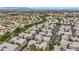 A Nevada neighborhood featuring townhouses with desert landscaping at 2052 Gravel Hill St # 207, Las Vegas, NV 89117