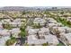 Expansive aerial view of a large neighborhood showcasing many condo homes and beautiful landscaping at 2052 Gravel Hill St # 207, Las Vegas, NV 89117