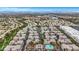 Overhead view of a Nevada residential area featuring townhouses with desert landscaping and community amenities at 2052 Gravel Hill St # 207, Las Vegas, NV 89117
