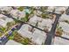 Nevada condos with a swimming pool and tennis court, showcasing the community's recreational amenities at 2052 Gravel Hill St # 207, Las Vegas, NV 89117