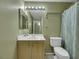 Bathroom with light-wood vanity, modern fixtures, and a tiled floor at 2052 Gravel Hill St # 207, Las Vegas, NV 89117