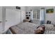 Cozy bedroom with natural light, a work station, and neutral-toned decor at 2052 Gravel Hill St # 207, Las Vegas, NV 89117