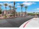 Gated community entrance with landscaped grounds and controlled access at 2052 Gravel Hill St # 207, Las Vegas, NV 89117