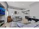 Bright living room featuring high ceilings, wood floors, and modern decor at 2052 Gravel Hill St # 207, Las Vegas, NV 89117