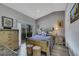 Spacious main bedroom with sliding glass door and wooden furniture at 2052 Gravel Hill St # 207, Las Vegas, NV 89117