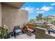 Cozy outdoor patio with seating and potted plants, offering a private retreat at 2052 Gravel Hill St # 207, Las Vegas, NV 89117
