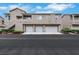 Inviting townhouse complex with attached garages and well-maintained landscaping at 2052 Gravel Hill St # 207, Las Vegas, NV 89117