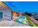 A sparkling pool, patio, and landscaped backyard make this a serene oasis at 2215 Bannerwood St, Henderson, NV 89044