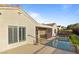 Beautiful backyard features a private swimming pool with manicured landscaping for outdoor entertaining at 2215 Bannerwood St, Henderson, NV 89044