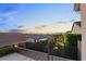 Backyard view showcasing the landscape, neighborhood, and scenic mountain views in the distance at 2215 Bannerwood St, Henderson, NV 89044