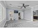 Large bedroom with bright natural lighting, ceiling fan and access to the backyard at 2215 Bannerwood St, Henderson, NV 89044
