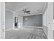 Spacious bedroom with neutral walls, carpet flooring, ceiling fan and natural lighting at 2215 Bannerwood St, Henderson, NV 89044