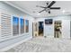Spacious bonus room with large windows, ceiling fan, gray carpet and outdoor access at 2215 Bannerwood St, Henderson, NV 89044