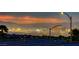Expansive Las Vegas skyline view with the mountains, displaying the city's stunning lights at twilight at 2215 Bannerwood St, Henderson, NV 89044