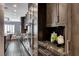 Elegant kitchen with custom cabinetry, granite countertops, and high-end stainless steel appliances at 2215 Bannerwood St, Henderson, NV 89044