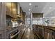 Gourmet kitchen with stainless steel appliances, granite countertops, and custom cabinets at 2215 Bannerwood St, Henderson, NV 89044