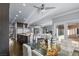 Bright kitchen featuring a large island, stainless steel appliances and adjacent dining area at 2215 Bannerwood St, Henderson, NV 89044