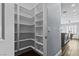 Walk-in pantry with ample shelving for organized storage at 2215 Bannerwood St, Henderson, NV 89044