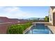 Inviting backyard pool area with lush landscaping and private fencing for relaxation and enjoyment at 2215 Bannerwood St, Henderson, NV 89044