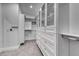 A large walk-in closet with an abundance of storage and custom shelving at 2215 Bannerwood St, Henderson, NV 89044