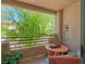 Relaxing balcony with comfortable seating and a peaceful outdoor view at 2240 Highpointe Dr # 203, Laughlin, NV 89029