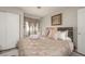 Serene bedroom with a comfortable bed, stylish accents, and ample closet space offering a peaceful, organized haven at 2240 Highpointe Dr # 203, Laughlin, NV 89029