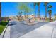 Inviting gated entrance to the Colorado Bay Club community surrounded by desert landscaping and palm trees at 2240 Highpointe Dr # 203, Laughlin, NV 89029