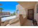 Inviting front entrance with security door, access ramp, and a charming welcome mat at 2240 Highpointe Dr # 203, Laughlin, NV 89029