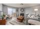 Comfortable living room with lots of natural light, fireplace, and luxury vinyl plank flooring at 2240 Highpointe Dr # 203, Laughlin, NV 89029