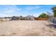 Spacious backyard with a small home and fencing at 2257 Colebrook St, Las Vegas, NV 89115