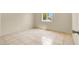 A cozy bedroom featuring tile flooring and a bright window at 2257 Colebrook St, Las Vegas, NV 89115