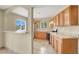 Kitchen with light wood cabinets and a window looking to the backyard at 2257 Colebrook St, Las Vegas, NV 89115
