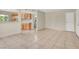Open-concept living space with tile flooring and a view of the kitchen and bathroom at 2257 Colebrook St, Las Vegas, NV 89115
