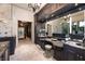 Stylish bathroom with elegant vanity, stone accents, and luxury fixtures, showcasing a bright, airy feel at 2323 Pinto Ln, Las Vegas, NV 89107