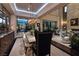 Elegant dining room featuring a large dining table, designer lighting, and an open floor plan at 2323 Pinto Ln, Las Vegas, NV 89107