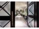 Grand entryway with ornate glass doors and views of the home's interior at 2323 Pinto Ln, Las Vegas, NV 89107