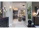 Hallway provides entry to the kitchen with modern cabinetry and stainless steel appliances at 2323 Pinto Ln, Las Vegas, NV 89107
