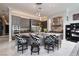 Modern kitchen with an oversized island, pendant lighting, and stainless steel appliances at 2323 Pinto Ln, Las Vegas, NV 89107