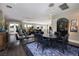 A spacious living room with high ceilings, a dining area, and a view to the outside at 2323 Pinto Ln, Las Vegas, NV 89107