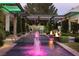 Relaxing pool featuring fountains, fire pits, and elegant patio furniture for outdoor entertaining at 2323 Pinto Ln, Las Vegas, NV 89107