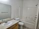 Bathroom with light wood vanity, sink, toilet, and shower/tub at 2615 W Gary Ave # 1085, Las Vegas, NV 89123