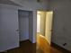 Bedroom featuring a closet with shelving and wood flooring at 2615 W Gary Ave # 1085, Las Vegas, NV 89123
